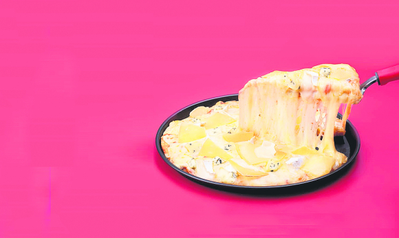 La pizza con más queso crece con franquicias